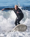 Jonah Hill shows off his new bleach blond hairdo during a surfing ...
