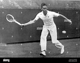 H Ellsworth Vines (l) chances his arm with his famous forehand Stock ...