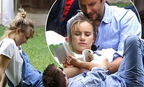 Bradley Cooper, 38, reads Lolita to Suki Waterhouse, 21, as she sprawls ...