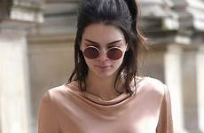 kendall jenner braless nipples pink satin poking her paris off nipple piercing she shows top sheer down steps fashion france