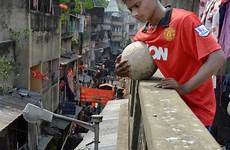 manchester united football teenager prostitute midfielder slumdog train mother his rajib brother whose slum pictured grew kolkata centre friends where