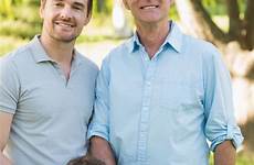 father son grandfather smiling park blurred against background stock three people royalty