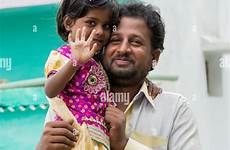 daughter father indian india smiling andhra pradesh waving cuddle stock alamy his