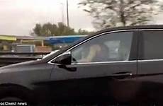 sex having motorway driving passenger caught female his filmed while man 45mph car couple motorist bloke horny down highway moscow