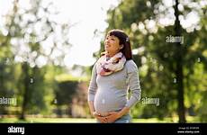 pregnant asian woman japanese alamy happy stock park young