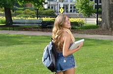 college cute campus walking student female stock looking stands