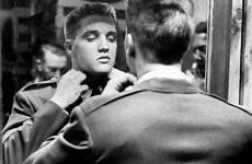 elvis presley army 1958 joins amazing uniform hair his interesting adjusts shorn after joining sheep mirror photographs chaffee fort induction