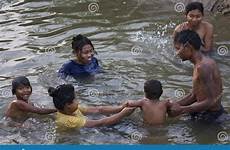 bathing family river bath myanmar preview