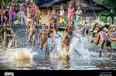 tribe children asmat kids swim people bathe alamy fun noisy