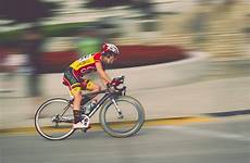 cycling bicycle sport bike racing race sports road cycle speed biking track athlete blur bicyclist exercise cross competition cyclo stock