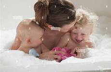 bubble bath alamy having mother children