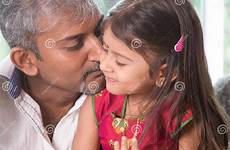 kissing father daughter toddler stock indian dad indoor lifestyle asian dreamstime happy his family