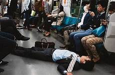 tokyo sleeping man people japanese train twitter shibuya his account lies spread back down gathers via streets dozing posts off