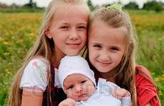 sisters brother two baby hug family another outdoors happy stock colourbox