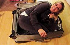 suitcase stuck girl