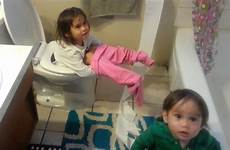 toilet girl baby falls while paper mess makes brother
