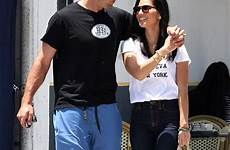 aaron rodgers olivia munn kiss nfl scores her la they together athlete smiles hunky conversation leaned brunch plant left down