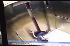 leg woman stuck doors between after lift getting elevator closing china trapped her has cut severed off allegedly faulty had