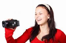 camera girl holding woman filming camcorder person female young smiling hand photography shoot smile digital isolated arm technology equipment happy