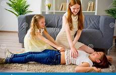 tickling mother daughters tickle playing two mom stock preview female