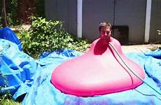 gif water balloon slow mo inside guy wtf balloons giant gifs big pops when giphy sitting