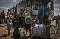 ukraine refugees refugee ukrainians flee shellshocked torn donetsk migrants syria sergey ponomarev