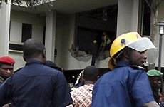bomber suicide smashes nigeria un office car workers blast after abuja into ambulances gather rescue cause thought been which