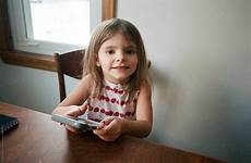 smartphone little girl stocksy