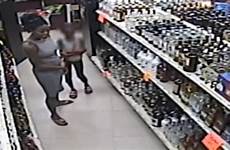 caught woman child camera store shoplift steal shoplifting teaching liquor florida