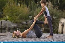pose practicing yoga bird son mother hobbies outdoors