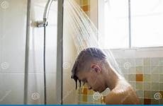 showering man young bathroom caucasian stock