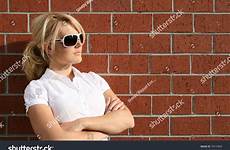 blond brick against wall shutterstock stock