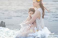 breastfeeding photographer extended beach family