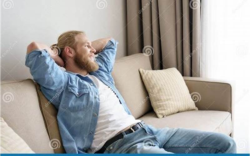 A Picture Of Someone Lounging On A Couch