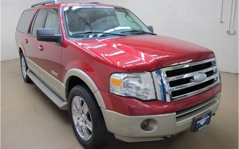 A Red 2007 Ford Expedition Parked In A Driveway