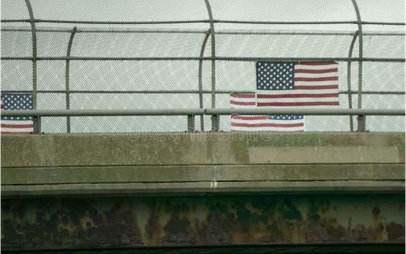American Flag Displayed On Overpass