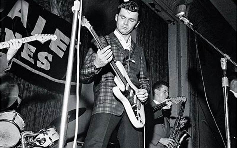 Dick Dale Playing Guitar On Stage