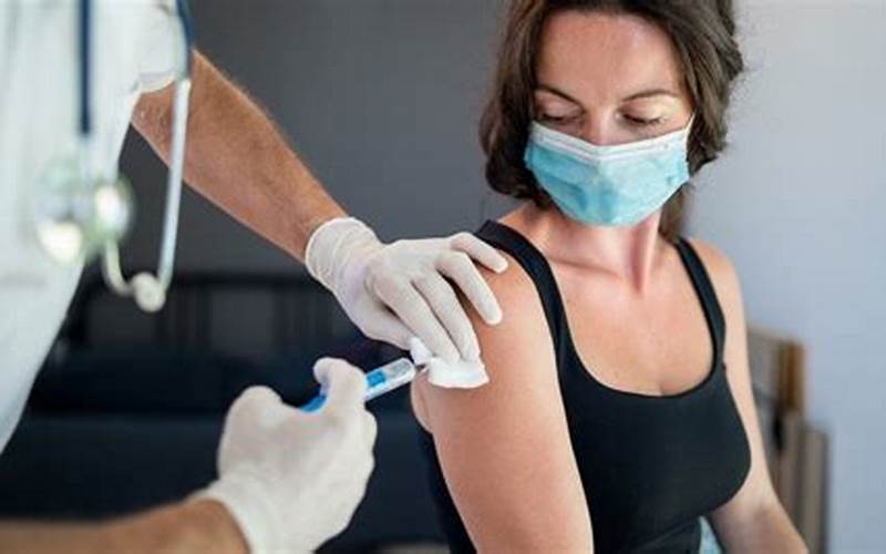 Image Of A Woman Receiving A Travel Vaccine