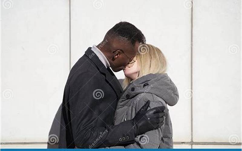 Interracial Couple Kissing