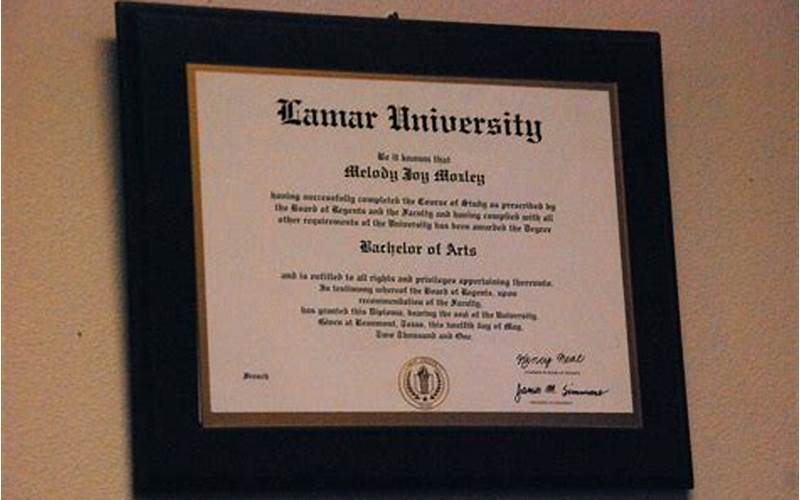 Lamar Bursey With Diploma