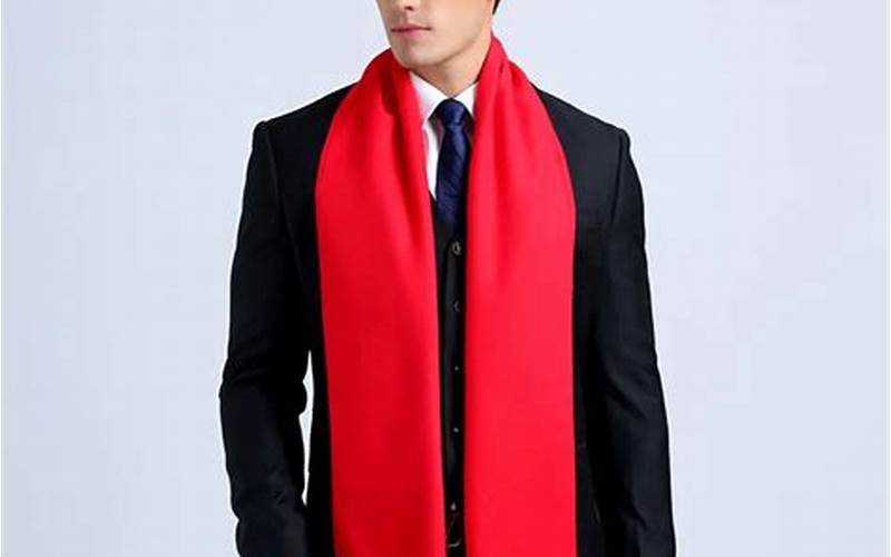 Man Wearing A Bright Red Scarf