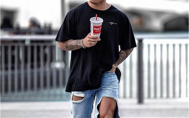 Man Wearing Ripped Jeans