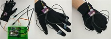 WaveGlove: A glove with five inertial sensors for hand gesture recognition