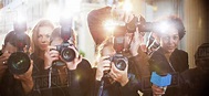 Portrait of paparazzi in a row with cameras and microphone - Stock ...