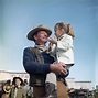 John Wayne And Daughter Aissa On Movie by Bettmann