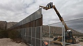 Trump says border wall will 'also help Mexico'