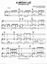 A Media Luz (The Light Of Love) sheet music for voice, piano or guitar