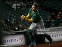 Oakland Athletics catcher Kyle McCann makes the last out in the ninth ...