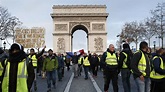 Protesters march through Paris amid fears of new violence