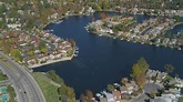 4K stock footage aerial video of flying over homes surrounding Westlake ...